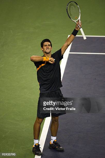 Novak Djokovic of Serbia celebrates a point to Guilles Simon of France during day six of 2009 Shanghai ATP Masters 1000 at Qi Zhong Tennis Centre on...
