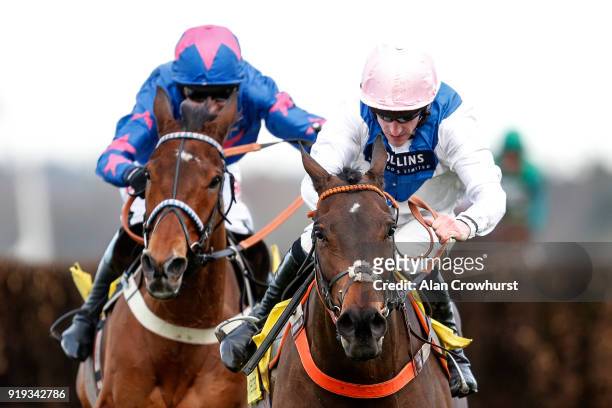 Brian Hughes riding Waiting Patiently clear the last to win The Betfair Ascot Steeple Chase from Cue Card at Ascot Racecourse on February 17, 2018 in...