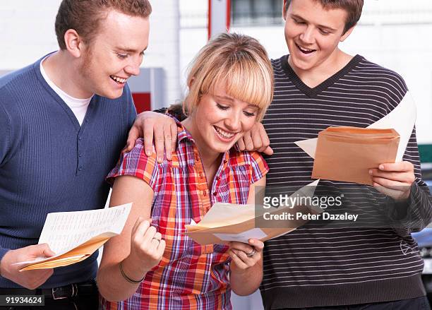 student teenagers opening good exam results - a grade stock pictures, royalty-free photos & images