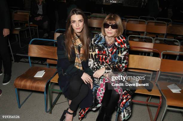 Bee Shaffer and Anna Wintour wearing Burberry at the Burberry February 2018 show during London Fashion Week at Dimco Buildings on February 17, 2018...