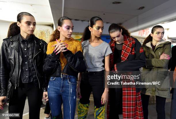 Models backstage ahead of the Halpern show during London Fashion Week February 2018 on February 17, 2018 in London, England.