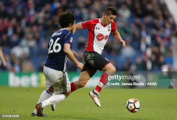 Ahmed Hegazy of West Bromwich Albion and Guido Carrillo of Southampton during The Emirates FA Cup Fifth Round match between West Bromwich Albion and...