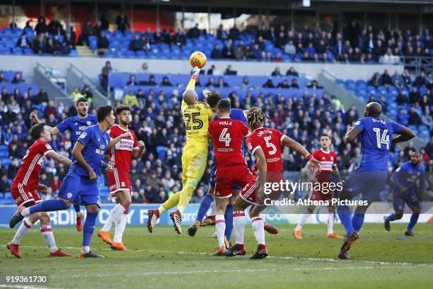 Darren Randolph of Middlesbrough punches away the ball under pressure from Sean Morrison of Cardiff City during the Sky Bet Championship match...