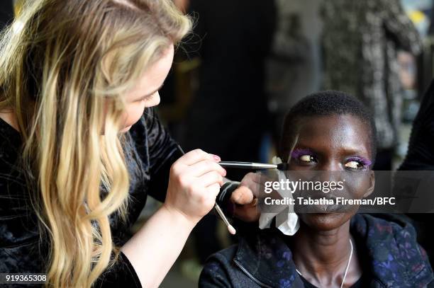 Model backstage ahead of the Halpern show during London Fashion Week February 2018 on February 17, 2018 in London, England.