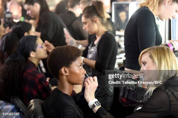 Model backstage ahead of the Halpern show during London Fashion Week February 2018 on February 17, 2018 in London, England.