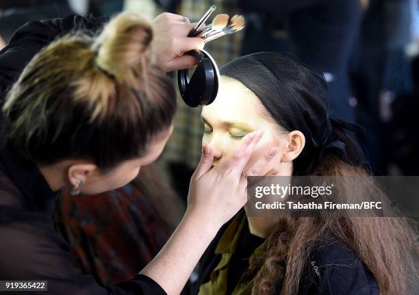 Model backstage ahead of the Halpern show during London Fashion Week February 2018 on February 17, 2018 in London, England.