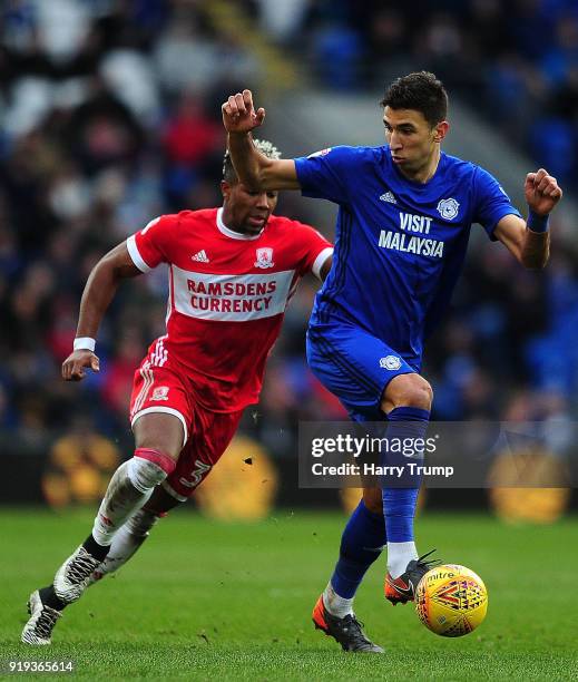 Marko Grujic of Cardiff City is tackled by Adama Traore of Middlesbrough during the Sky Bet Championship match between Cardiff City and Middlesbrough...