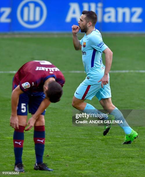 Barcelona's Spanish defender Jordi Alba celebrates after scoring his team's second goal during the Spanish league football match between SD Eibar and...