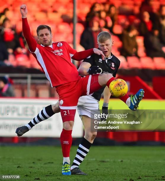 Lincoln City's Elliott Whitehouse vies for possession with Crawley Town's Dannie Bulman during the Sky Bet League Two match between Crawley Town and...