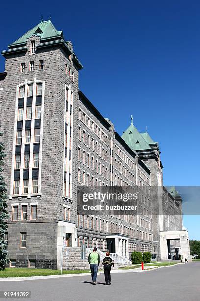 university building - buzbuzzer stock pictures, royalty-free photos & images