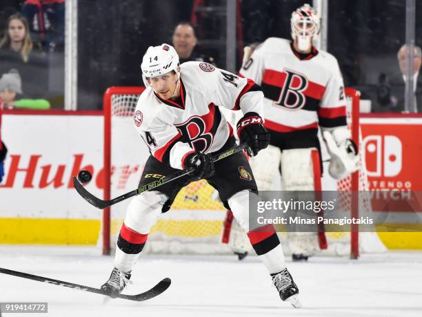 Jim O'Brien of the Belleville Senators plays the puck against the Laval Rocket during the AHL game at Place Bell on February 14, 2018 in Laval,...