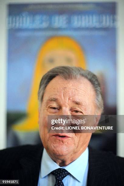 Albert Uderzo, French author and illustrator who launched the Asterix comics strip character with author Rene Goscinny, poses after received honorary...