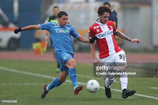 Isamel Bennacer of Empoli FC battles for the ball with Jacopo Dezi of Parma Calcio during the serie B match between FC Empoli and Parma Calcio at...