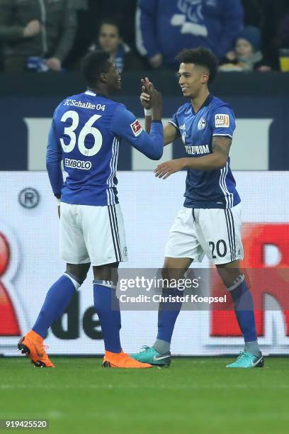 Thilo Kehrer of Schalke celebrates with Breel Embolo of Schalke after he scored a goal to make it 1:0 during the Bundesliga match between FC Schalke...