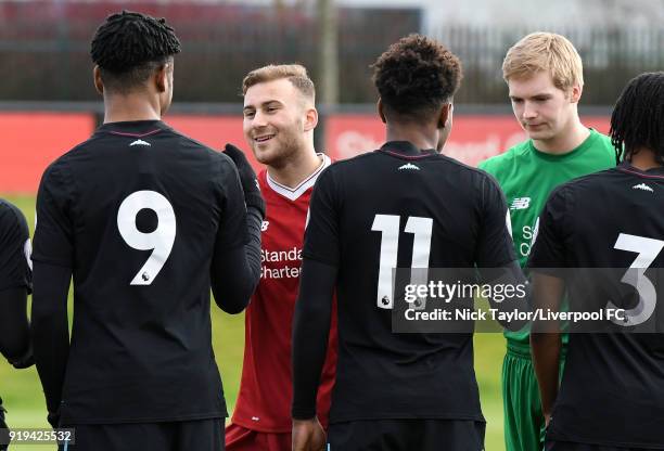 Herbie Kane and goalkeeper Caoimhin Kelleher of Liverpool during the handshake with the West Ham United players before the Liverpool v West Ham...