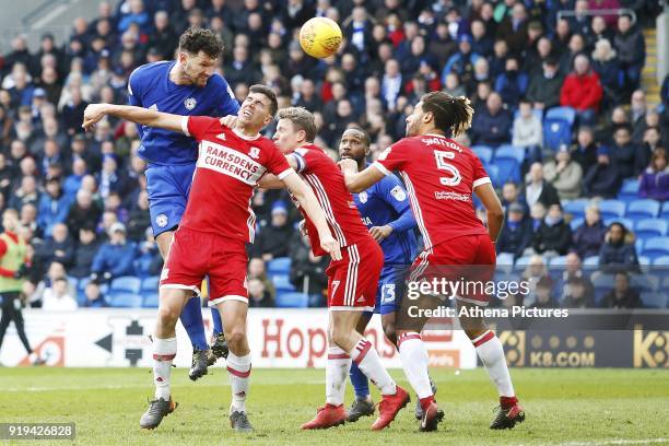 Sean Morrison of Cardiff City heads the ball towards under pressure from Daniel Ayala of Middlesbrough during the Sky Bet Championship match between...