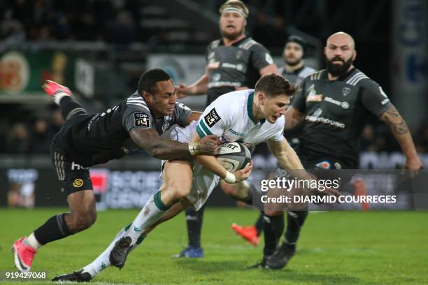 Pau's fullback Colin Slade runs with the ball during the French Top 14 rugby union match CA Brive vs Pau on February 17, 2018 at the Amede Domenech...