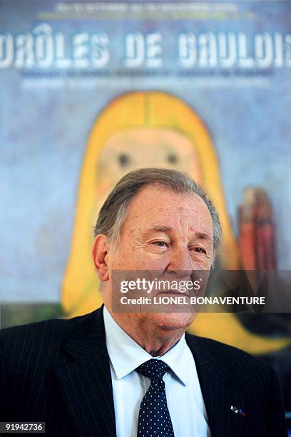 Albert Uderzo, French author and illustrator who launched the Asterix comics strip character with author Rene Goscinny, poses after received honorary...