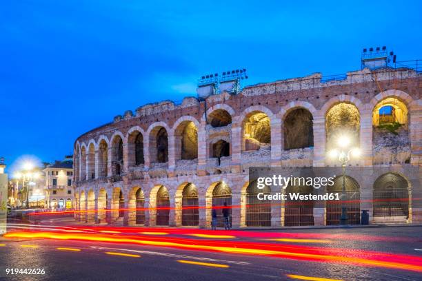 italy, veneto, verona, old town, amphitheatre, light trails, blue hour - arena di verona stock pictures, royalty-free photos & images