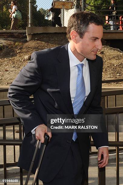 Howard K. Stern leaves the Los Angeles Superior Court with members of his legal team on October 15, 2009 after the third day of a preliminary hearing...