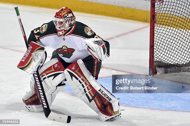 Niklas Backstrom of the Minnesota Wild warms up in the crease prior to the game against the Anaheim Ducks on October 14, 2009 at Honda Center in...