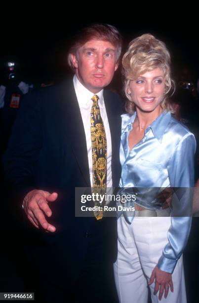 Donald Trump and wife Marla Maples walks in the tunnel as they attend the Mike Tyson and Peter McNeeley fight on August 19, 1995 at the MGM Grand Las...