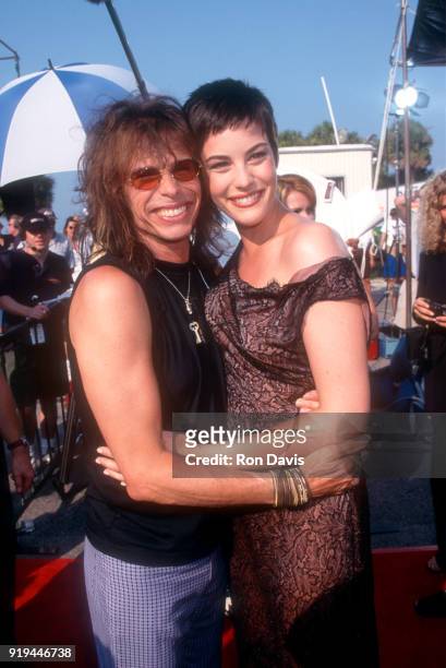 American singer-songwriter Steven Tyler and his daughter Liv Tyler pose for a portrait circa 1993.
