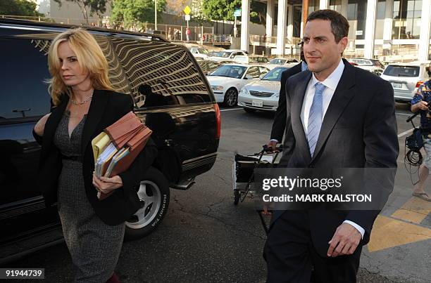 Howard K. Stern leaves the Los Angeles Superior Court with members of his legal team on October 15, 2009 after the third day of a preliminary hearing...