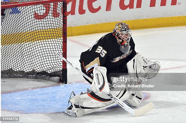 Jean-Sebastien Giguere of the Anaheim Ducks warms up in the net prior to the game against the Minnesota Wild on October 14, 2009 at Honda Center in...