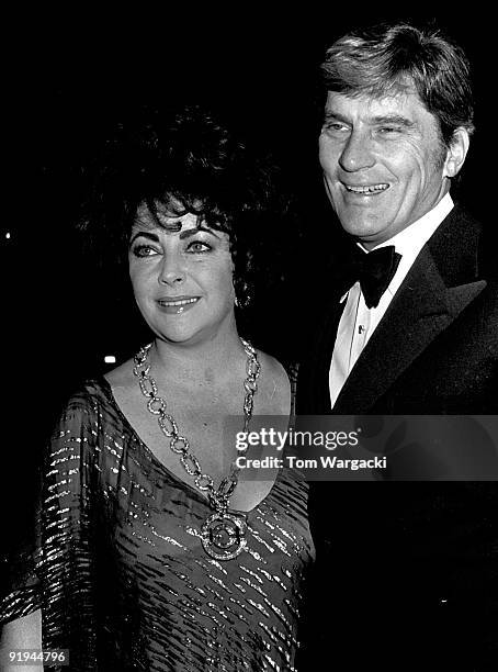 Elizabeth Taylor and husband Senator John Warner at a charity dinner in New York 1977