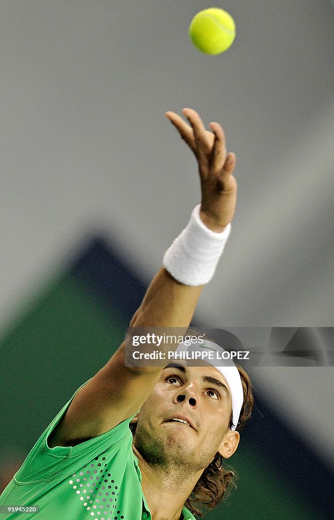 Rafael Nadal of Spain serves against Iva