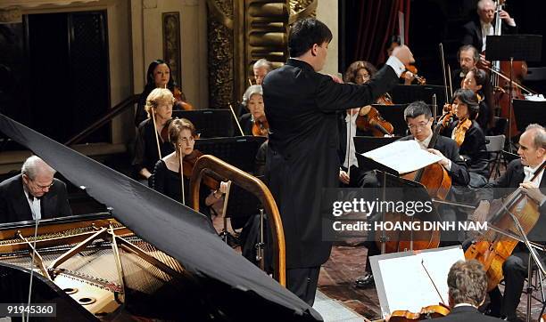 Pianist Emmanuel Ax plays Beethoven's Piano Concerto No. 4 with the New York Philharmonic conducted by music director Alan Gilbert during a concert...