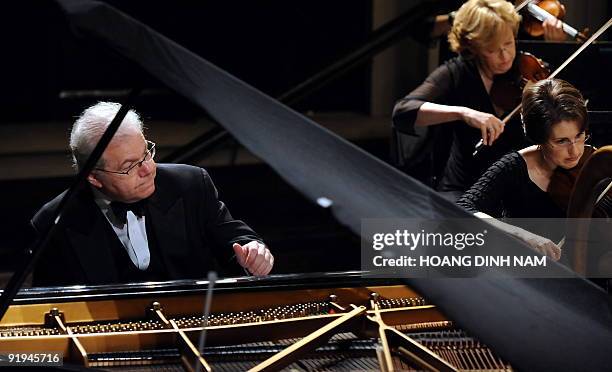 Pianist Emmanuel Ax plays Beethoven's Piano Concerto No. 4 with the New York Philharmonic during a concert given at the Hanoi Opera House on October...