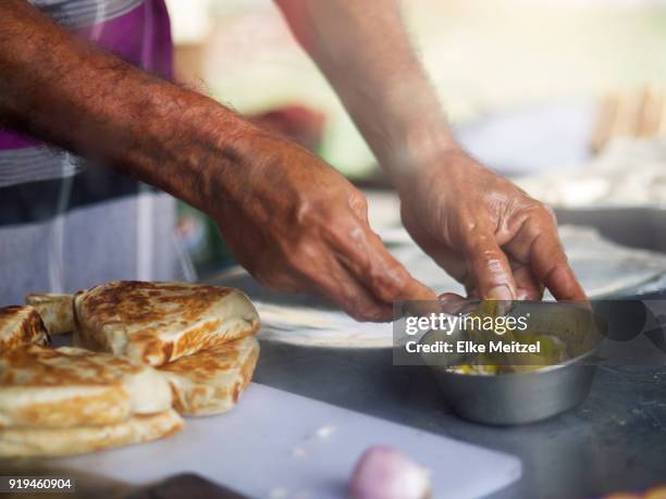 hands mixing and preparing food at food stall - samosa stock pictures, royalty-free photos & images
