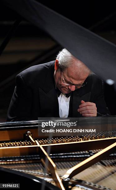 Pianist Emmanuel Ax plays Beethoven's Piano Concerto No. 4 with the New York Philharmonic during a concert given at the Hanoi Opera House on October...