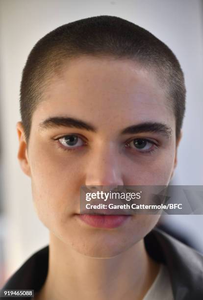 Model backstage ahead of the Burberry show during London Fashion Week February 2018 at Dimco Buildings on February 17, 2018 in London, England.