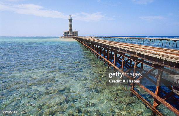 19th century british lighthouse on daedalus reef (abu el-kizan), red sea, egypt - lighthouse reef - fotografias e filmes do acervo