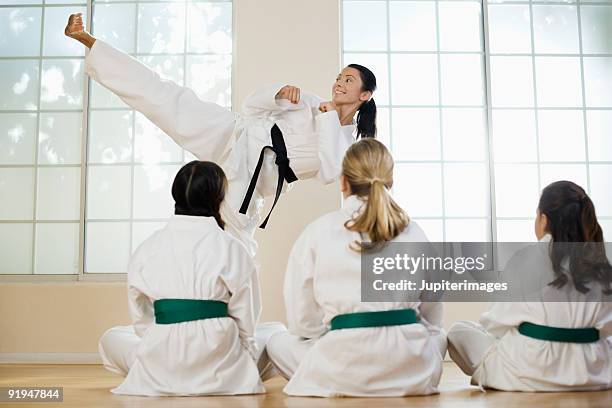 0 - karate woman stock pictures, royalty-free photos & images