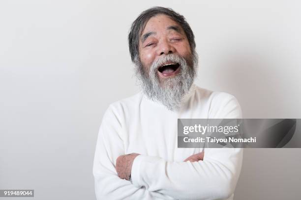 laughing senior - elderly cognitive stimulation therapy stockfoto's en -beelden