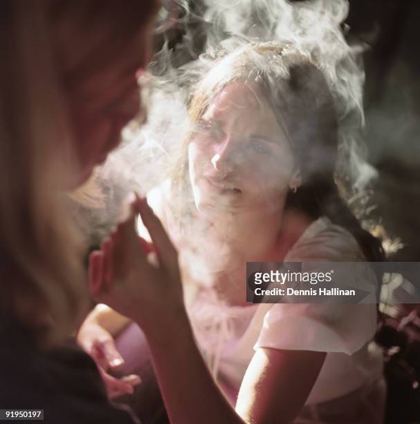 Young couple smoking marijuana