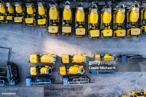 cement mixer trucks - construction machinery stock pictures, royalty-free photos & images