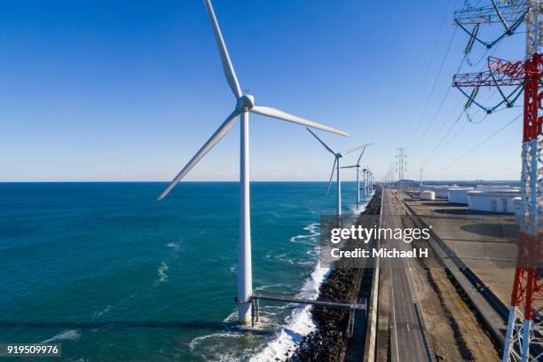 windmills by the sea - wind power japan stock pictures, royalty-free photos & images