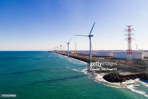 windmills by the sea - wind power japan stock pictures, royalty-free photos & images