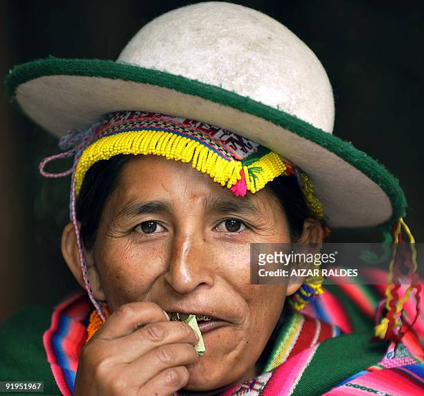 Bolivian woman chews coca leaves during a break at the 1st Summit of Social Movement Councils in the framework of the VII Summit Latin American ALBA...