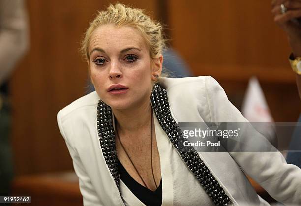 Actress Lindsay Lohan attends a court hearing at Beverly Hills Municipal Court on October 16, 2009 in Beverly Hills, California. Lohan was ordered to...