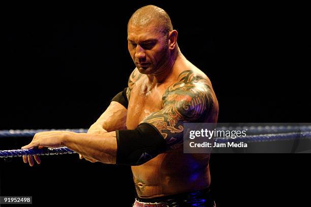 Wrestling fighter Batista stands on the ring during the WWE Smackdown wrestling function at Plaza Monumental Monterrey on October 15, 2009 in...