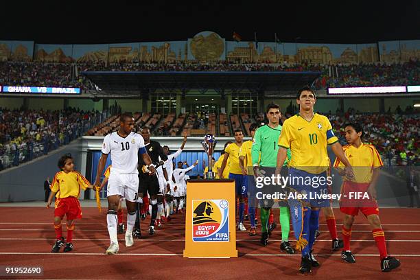 The players of Ghana and Brazil walk on to the pitch prior to the FIFA U20 World Cup Final between Ghana and Brazil at the Cairo International...