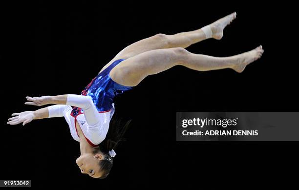 France's Pauline Morel performs in the balance beam event in the women's individual all-around final during the Artistic Gymnastics World...