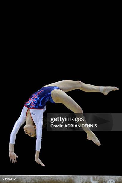 France's Pauline Morel performs in the balance beam event in the women's individual all-around final during the Artistic Gymnastics World...