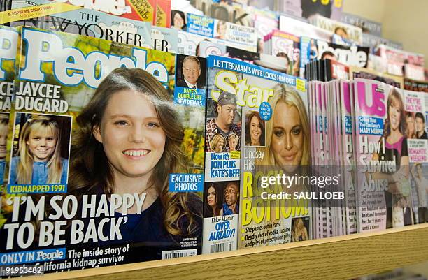 People Magazine's October 26 issue with recently freed kidnapping victim Jaycee Dugard on the cover, appears on a newstand in Washington on October...